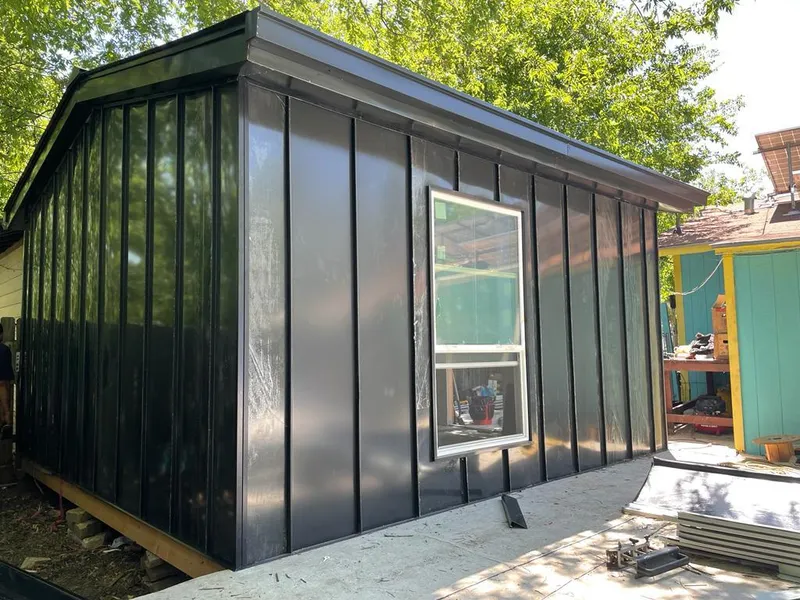 Black standing seam metal wall panels for Metal Roof Installation in Winslow