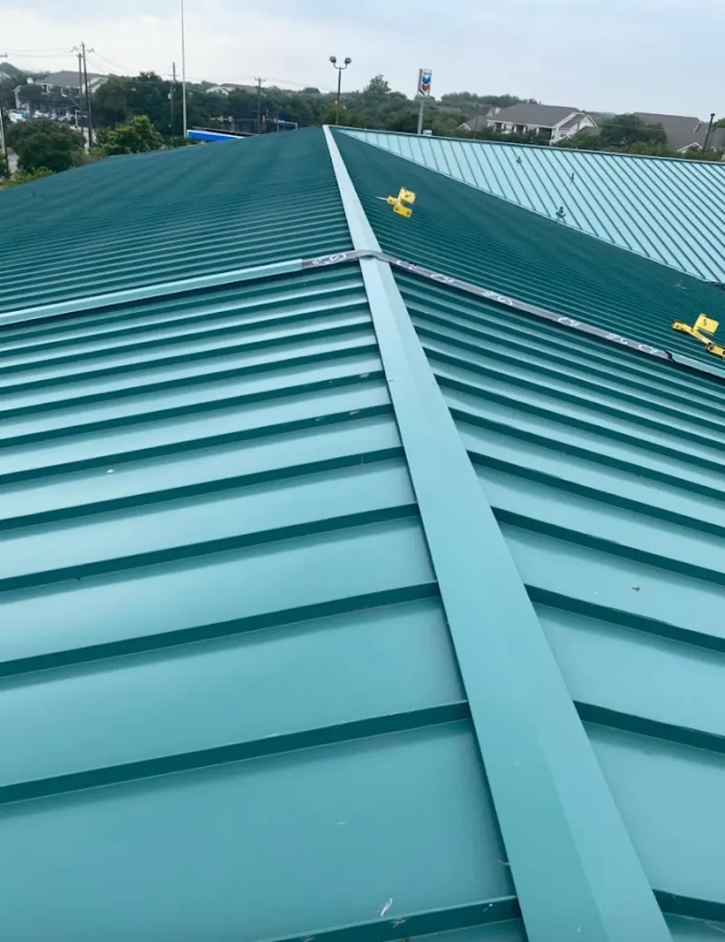 Green commercial metal roof ridge and valley for Metal Roof Repair in Winslow