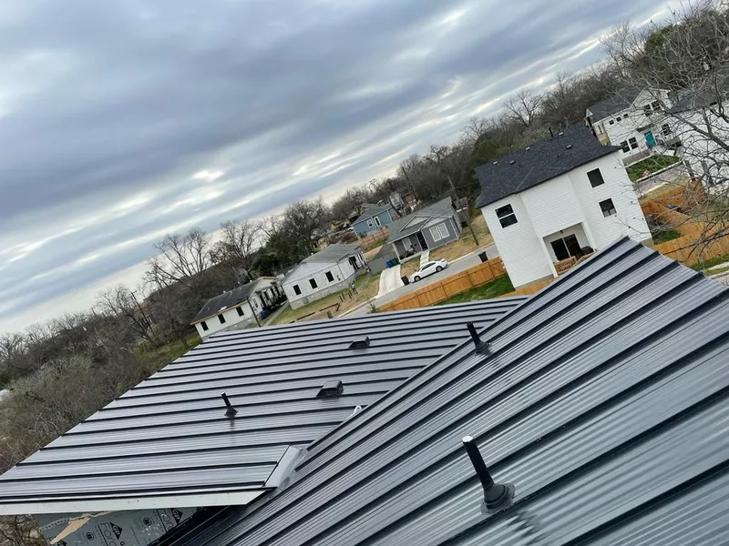 Standing seam metal roof panels with vents for Skylight Repair in Winslow